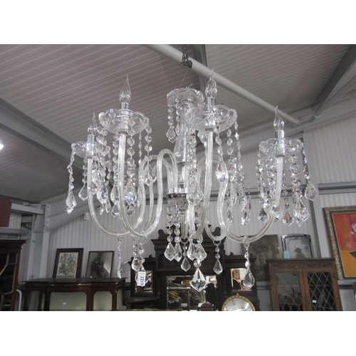 2219 - A glass eight arm chandelier