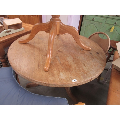 2308 - A round pine breakfast table