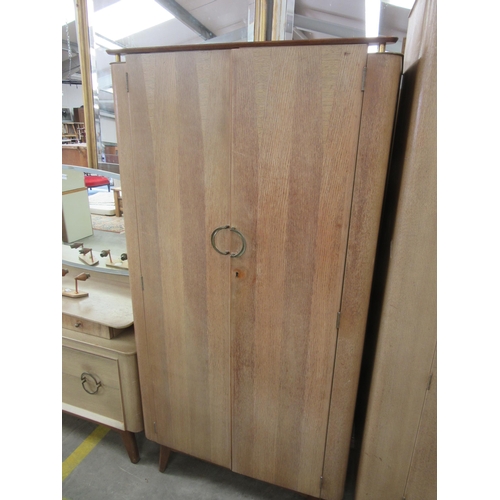 2339 - A mid century oak vener dressing chest with mirror and two wardrobes