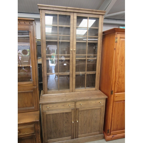 2347 - A modern oak and glazed kitchen cabinet