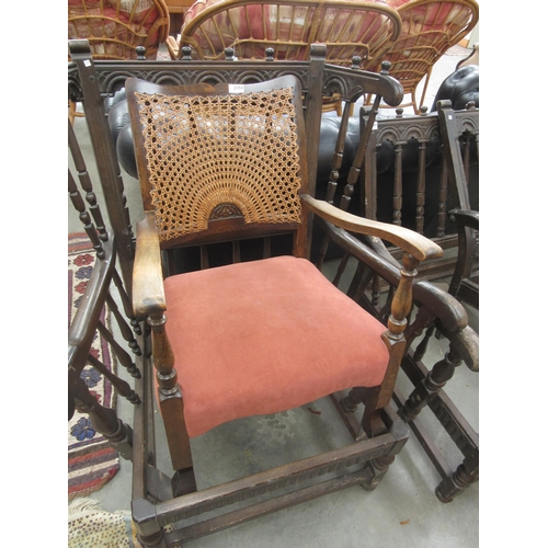 2350 - A 1930's cane back arm chair