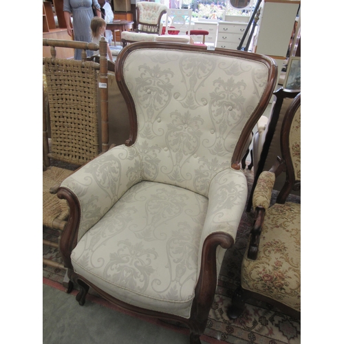 2356 - A Victorian mahogany framed spoon back arm chair