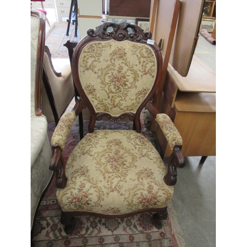 2357 - A Victorian mahogany scroll arm elbow chair