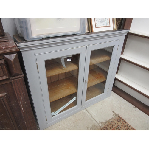 2386 - A Victorian glazed two door cabinet glass a/f