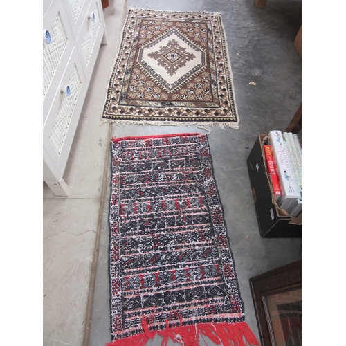 2393 - Four small hand woven rugs