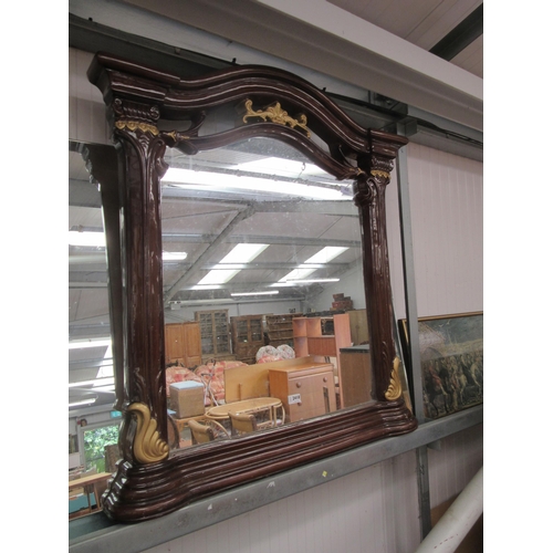 2418 - A resin faux mahogany framed mirror