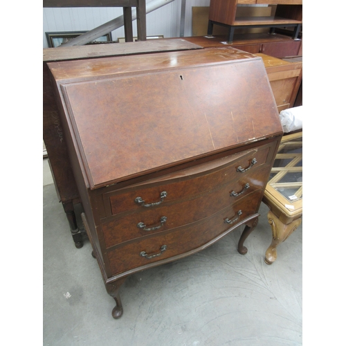 2433 - A walnut chest of three drawers, oak chest of three drawers and a dressing table (3)