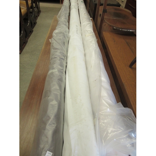 2438 - A roll of white soft Trevira material 3M wide