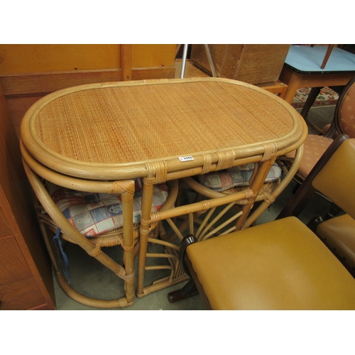 2445 - A bamboo table and two chairs