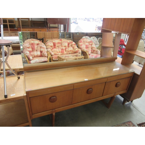 2451 - An Elliotts of Newbury dressing table with glass top and mirror