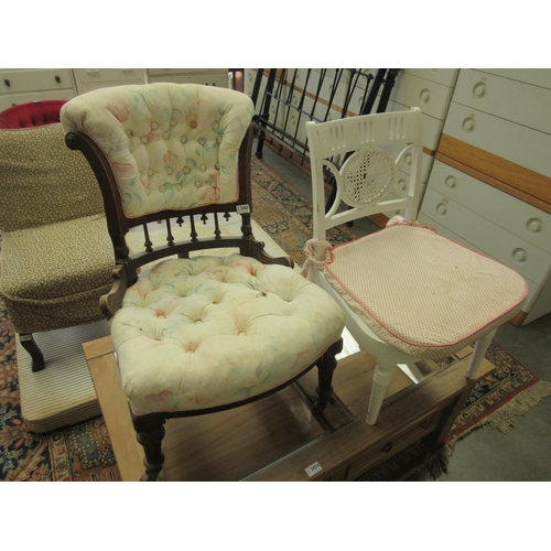 2455 - A Victorian nursing chair together with a painted rattan nursing chair