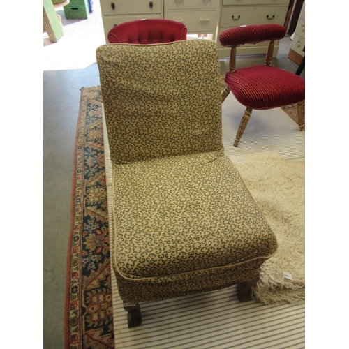 2456 - A 1930s oak nursing chair