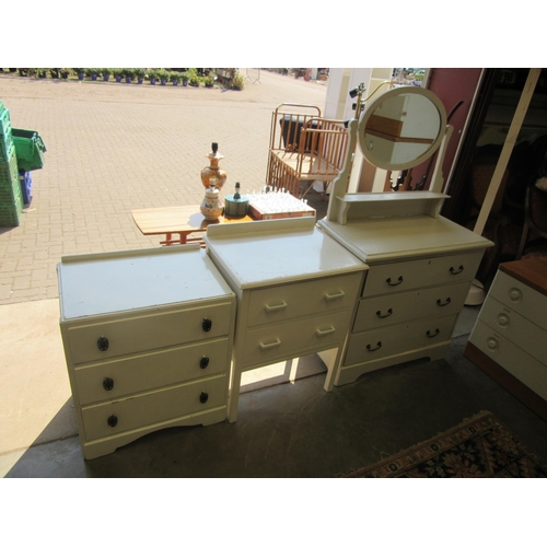 2461 - A painted dressing chest and two bedside chests