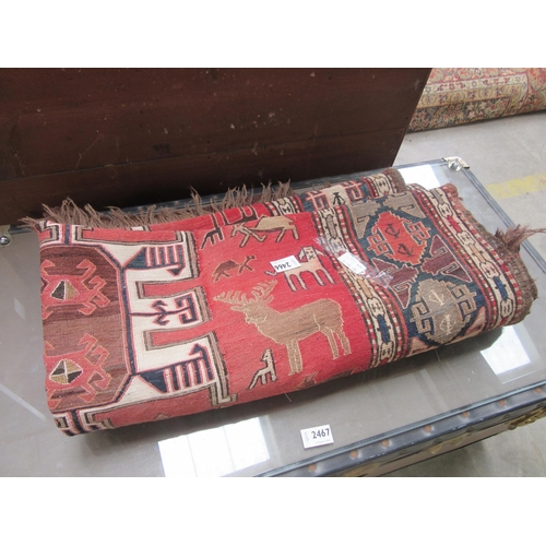 2466 - A Middle Eastern rug, red tones