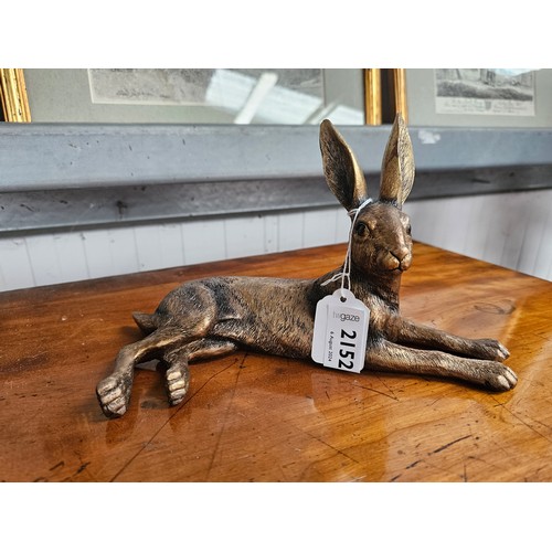 2152 - A resin bronze recumbant hare