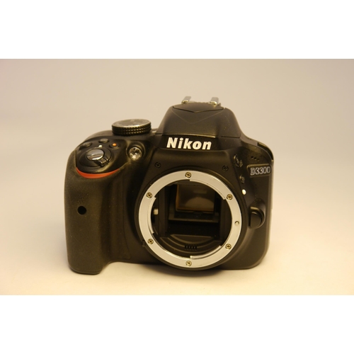 7004 - A Nikon D3300 24.2MP DSLR Camera with Nikon Nikkor AF-S 18-55mm f3.5-5.6 G DX VR II Zoom Lens