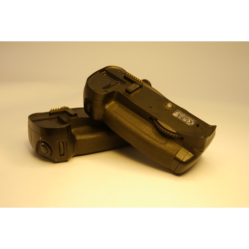 7064 - A pair of Nikon MB-D10 Battery Grips