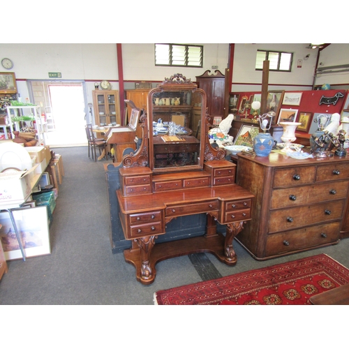 1144 - A Victorian mahogany dressing table, breakfront with scroll supports, eleven drawers, 178cm tall x 1... 