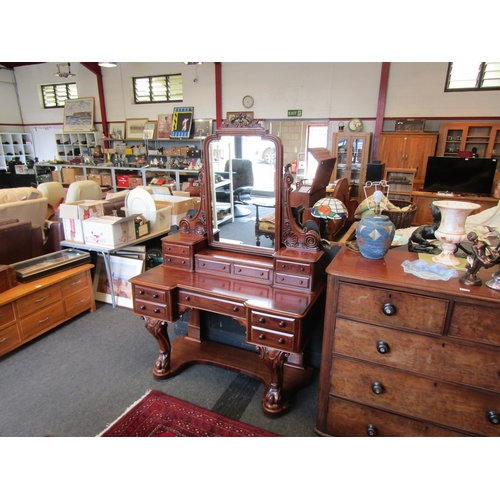 1144 - A Victorian mahogany dressing table, breakfront with scroll supports, eleven drawers, 178cm tall x 1... 