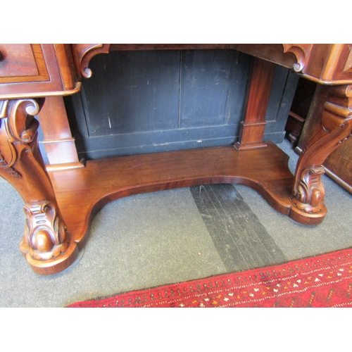 1144 - A Victorian mahogany dressing table, breakfront with scroll supports, eleven drawers, 178cm tall x 1... 