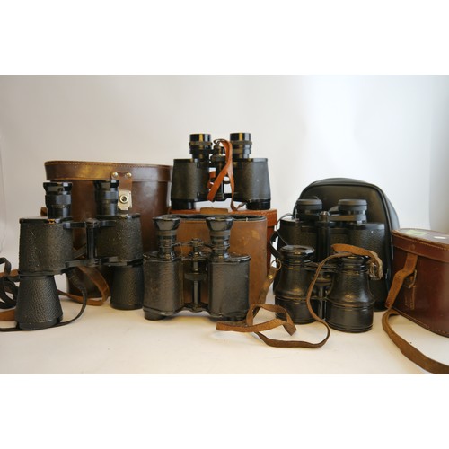 7069 - Five pairs of binoculars including two pairs of Deraisme military binoculars