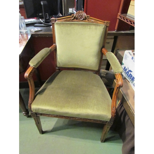 4002 - A Circa 1840 elm open armchair with green upholstery and carved decoration on square tapering reeded... 