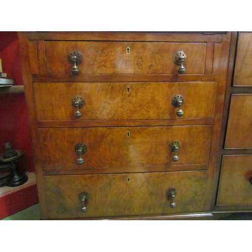 4072 - Circa 1930 a figured walnut writing bureau the fitted interior over four graduating drawers on brack... 