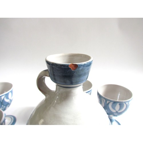 4112 - An Aldermaston Pottery wine carafe together with five goblets (chip to carafe), tallest 25cm