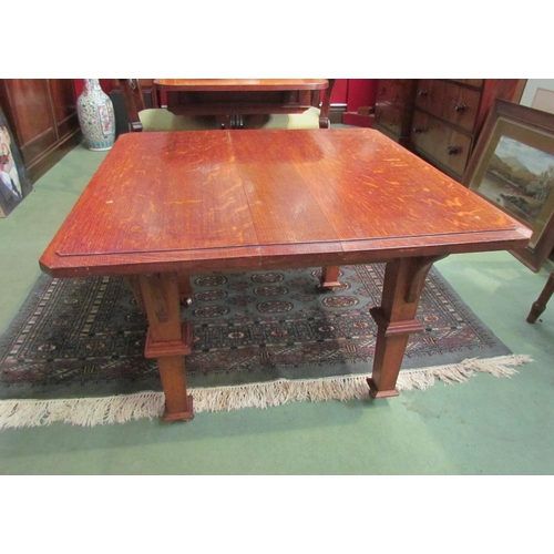 4202 - An Arts & Crafts oak coffee table, in the manner of Liberty's, raised on brass castors, 56cm tall x ... 