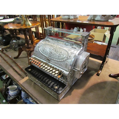 4239 - An NCR cash register; model 346, serial No. 796099, made in 1909.  Nickel plated case, Dolphin patte... 