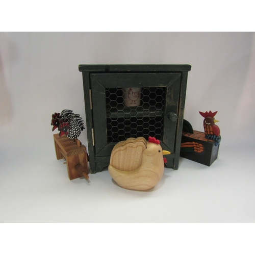 4338 - A rustic painted egg box, together with a set of wooden hen coasters, etc