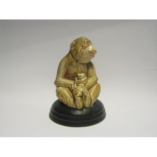 4355 - A Beswick Ware figure of a seated monkey on black base, model no 397, 18cm tall