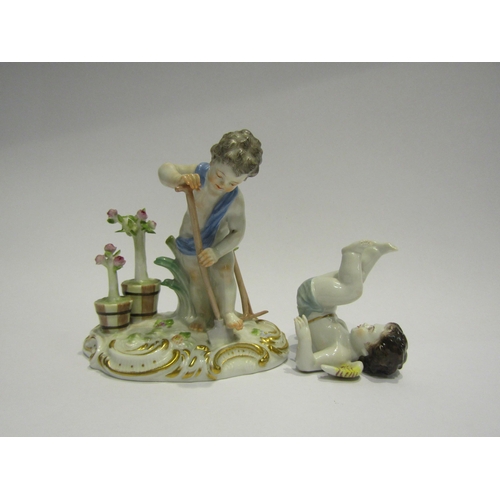 4357 - A Meissen figurine cherub gardener, blue cross swords to base, and a similar figurine of a tumbling ... 