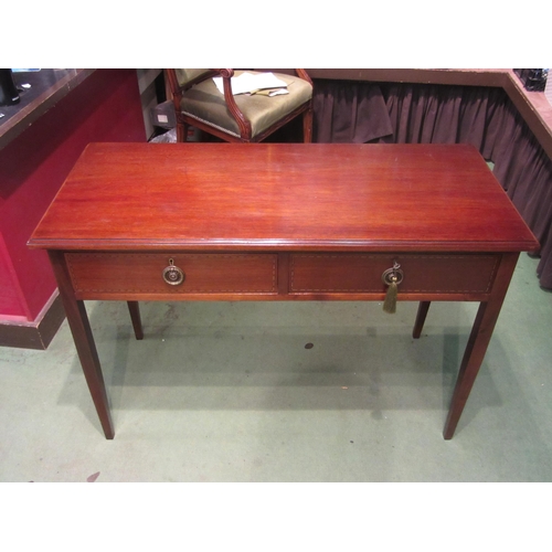 4001 - A Georgian mahogany side table, the two frieze drawers with line inlay over square tapering legs, 72... 