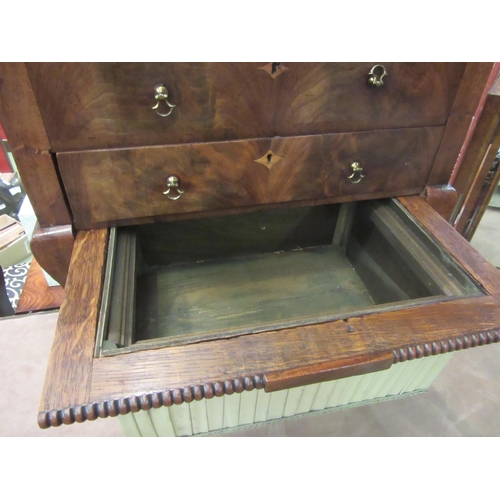 4009 - A George III flame mahogany work/sewing table with crossbanded decoration, the rising top and lift-o... 