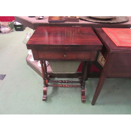 4019 - A circa 1840 rosewood games table the fold-over swivel top with inlaid backgammon/chess and cribbage... 