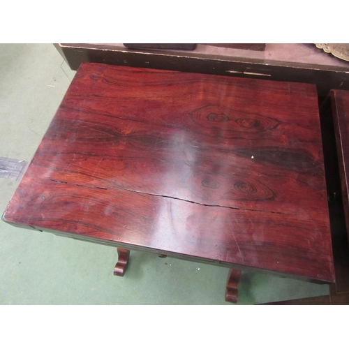 4019 - A circa 1840 rosewood games table the fold-over swivel top with inlaid backgammon/chess and cribbage... 