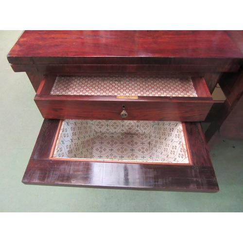 4019 - A circa 1840 rosewood games table the fold-over swivel top with inlaid backgammon/chess and cribbage... 