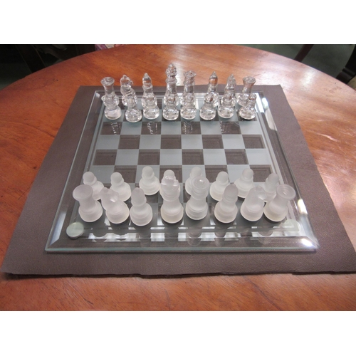 4083 - A glass chess board and set