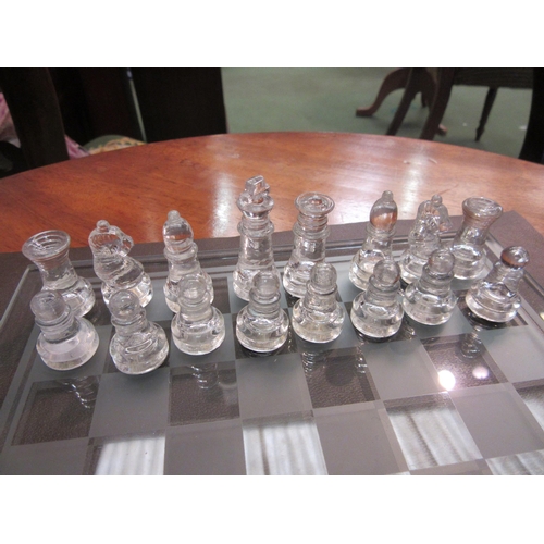 4083 - A glass chess board and set