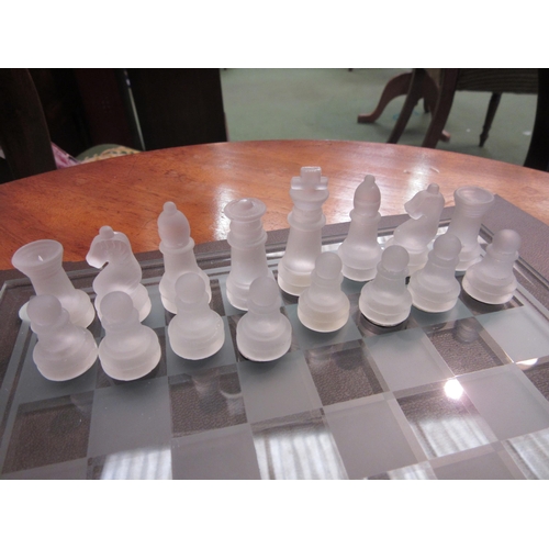 4083 - A glass chess board and set