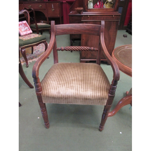 4092 - A Regency mahogany armchair, the rope twist carved cross rail on ring-turned arm supports and fore l... 