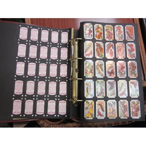 4193 - A large album of cigarette cards, Player's and Will's, Ogden's various subject matter, butterfly, ho... 