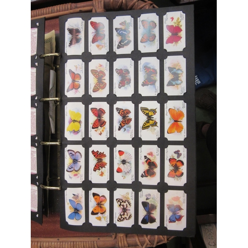 4193 - A large album of cigarette cards, Player's and Will's, Ogden's various subject matter, butterfly, ho... 