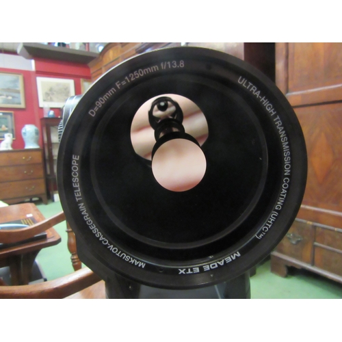 4199 - A Meade ETX telescope on tripod, with bag and case containing accessories including Autostar remote ... 