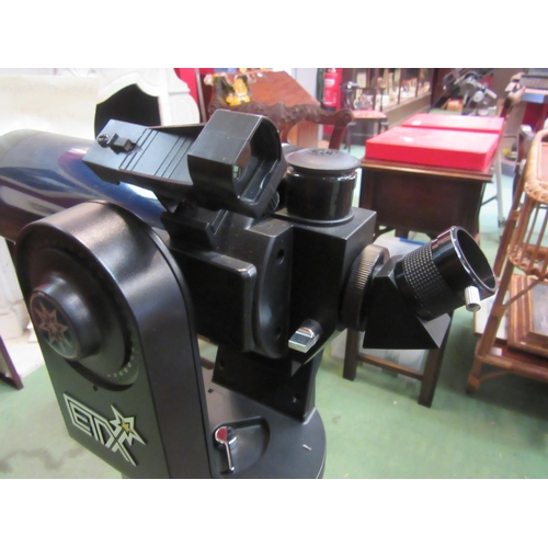 4199 - A Meade ETX telescope on tripod, with bag and case containing accessories including Autostar remote ... 