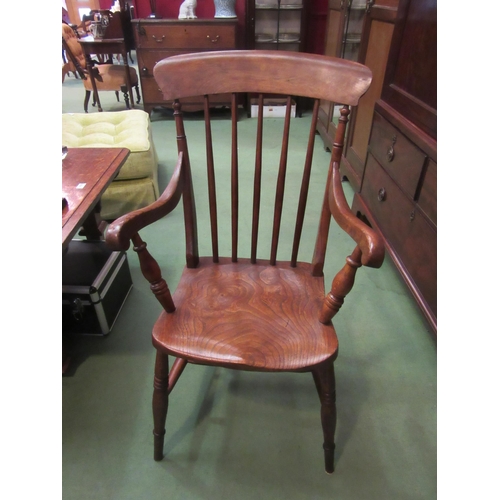 4200 - A circa 1860 elm and ash stick-back Windsor armchair (stamped C.M.) on ring-turned supports and legs... 