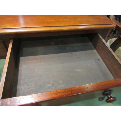 4211 - A late Victorian mahogany side table, the round corner top over two frieze drawers on turned and tap... 