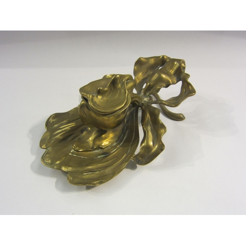 4365 - A brass leaf design inkwell, 20cm long