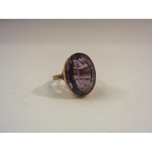 4404 - A gold and amethyst dress ring, total weight 5.9g